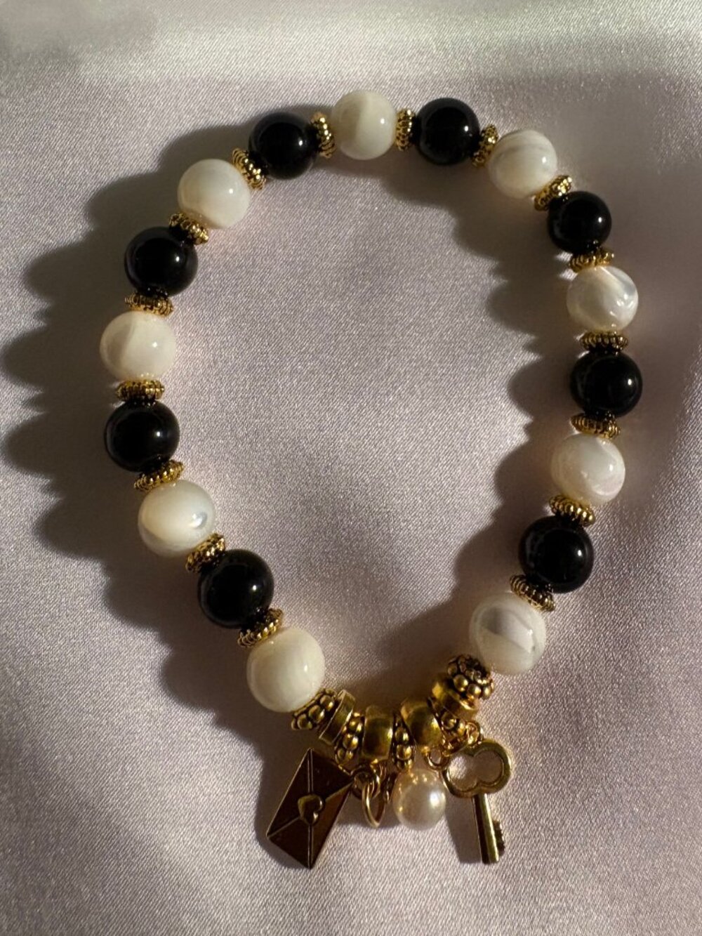 The Darcy Bond Bracelet is a refined, symbolic piece